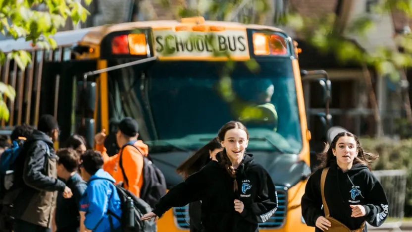 Students cheering and celebrating in the stands